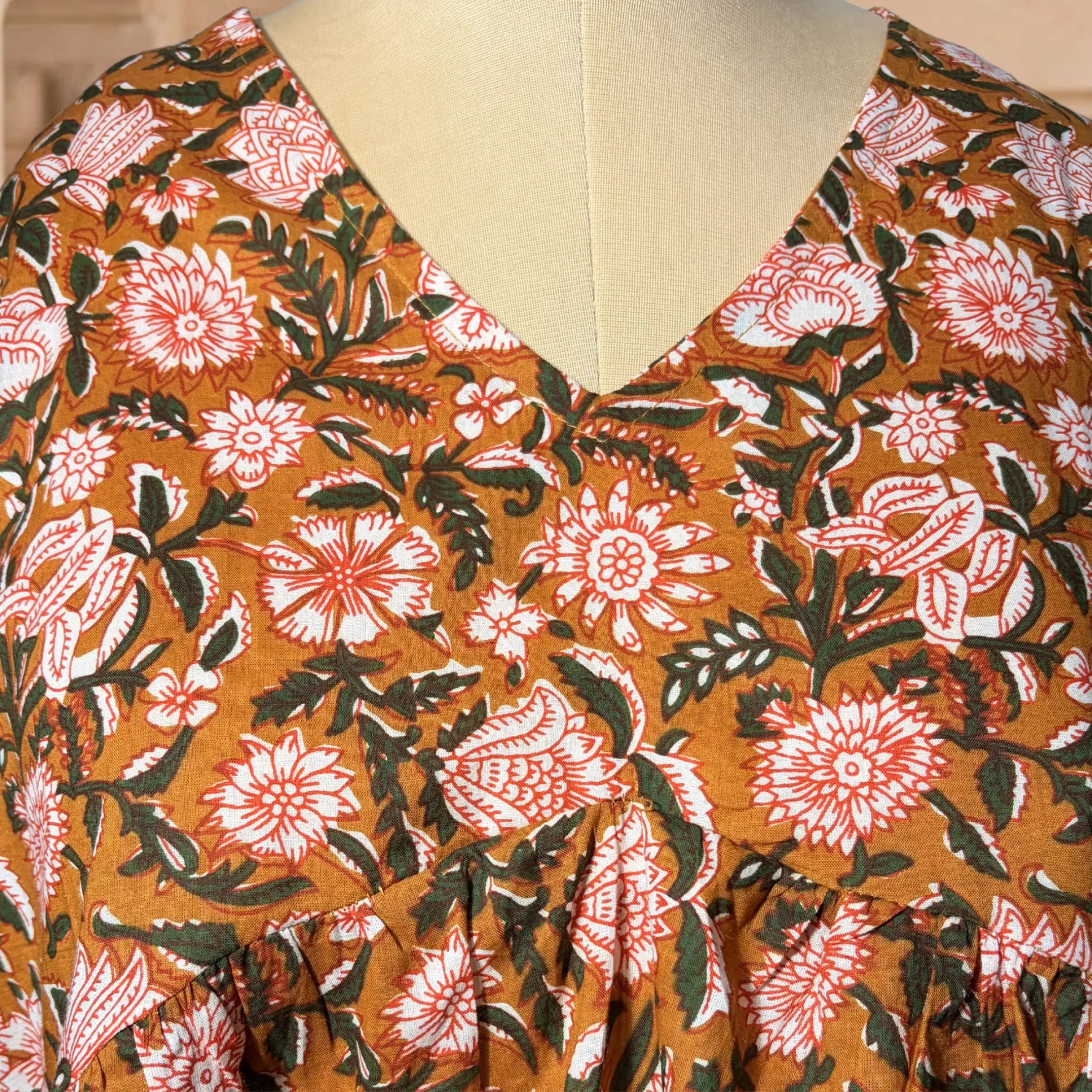 Rust Floral Peplum Top